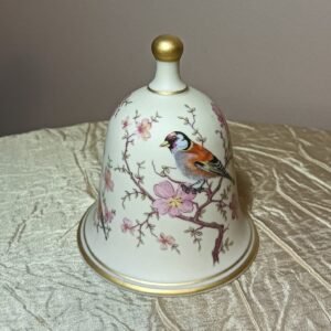 Ibis Aveiro porcelain bell with bird design